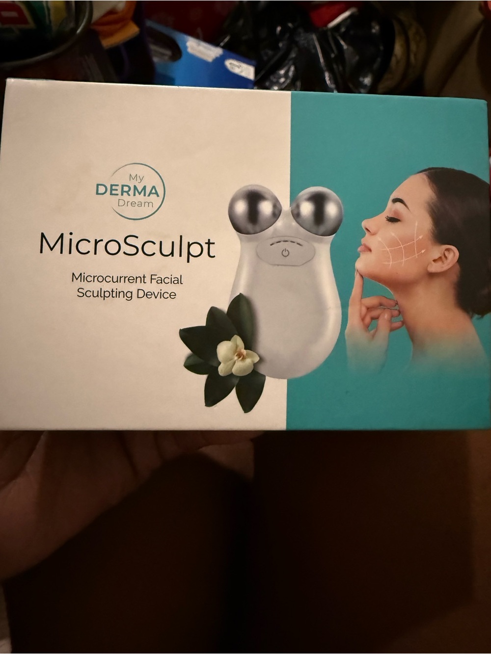dermalogica MicroSculpt Microcurrent Facial Sculpting Device in White and Teal